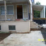 View of the side porch before restoration.