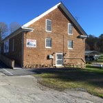 Back view of the store after restoration.  Work included repairing a lot of the brick mortar, new windows, and the handicap ramp.