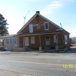 Store front before restoration.