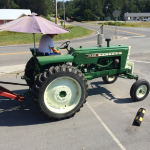 You know you are practicing in the country when the patients drive up on the farm tractor